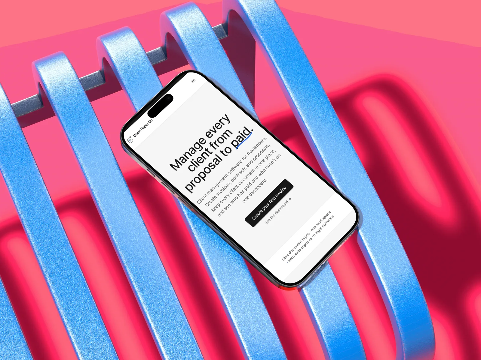 A phone resting on sculptural blue and pink shapes, showing the Client Paper Co. client tracker on its home screen